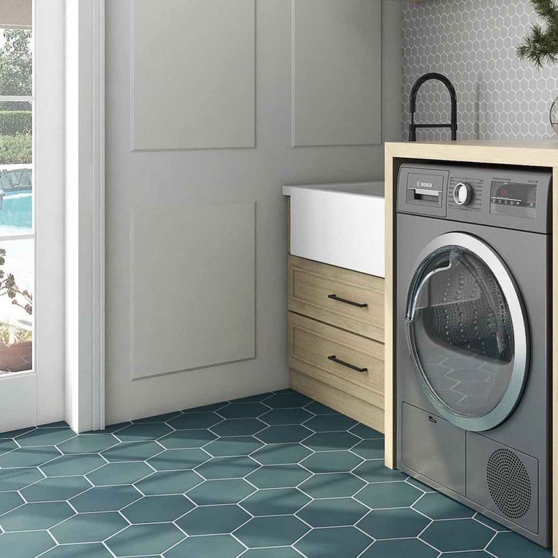 Laundry room featuring a hexagon tile in teal color