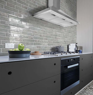 Urban Brick Porcelain Tile Ice 6x15 featured on a contemporary kitchen backsplash