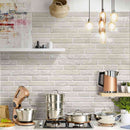 Urban Brick Porcelain Tile Vanilla 6x15 featured on a kitchen backsplash