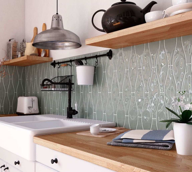 Wave Wall Tile Glossy Grey 3x12 installed on a farmhouse kitchen backsplash