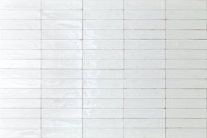 City Subway Tile White Glossy 2x10 installed on a wall