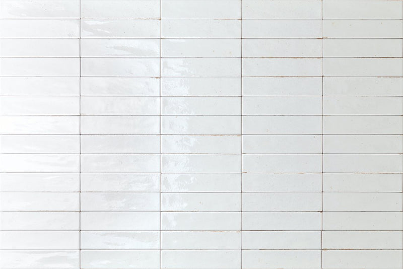 City Subway Tile White Glossy 2x10 installed on a wall